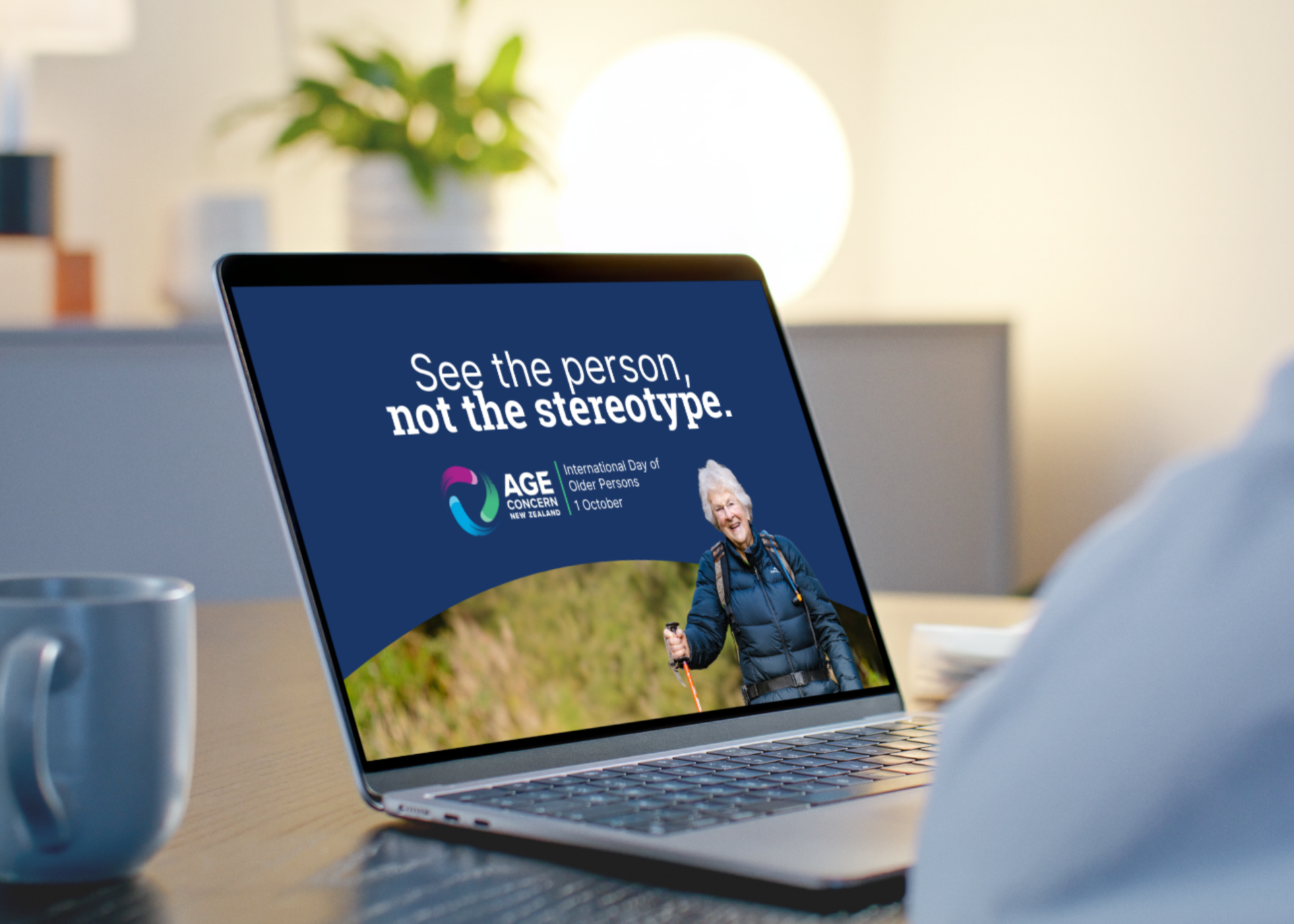 Computer showing the words 'See the person, not the Stereotype'