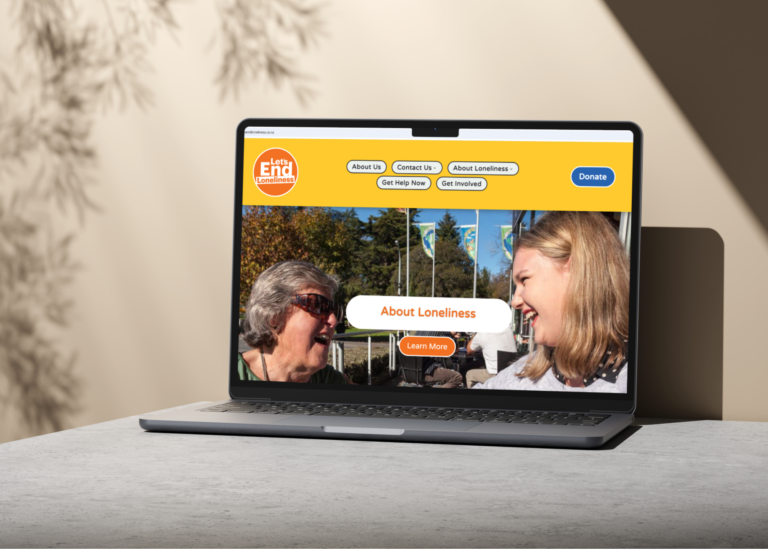 Let's end loneliness campaign shown on a laptop