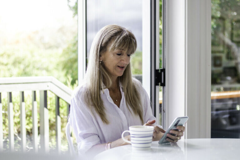 Older person looking at phone