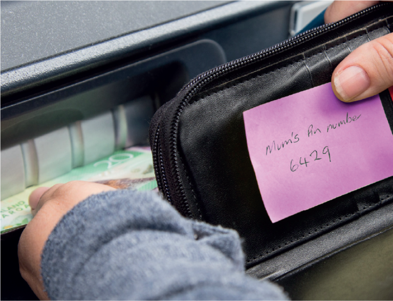 Photo of someone taking money from elderly persons wallet